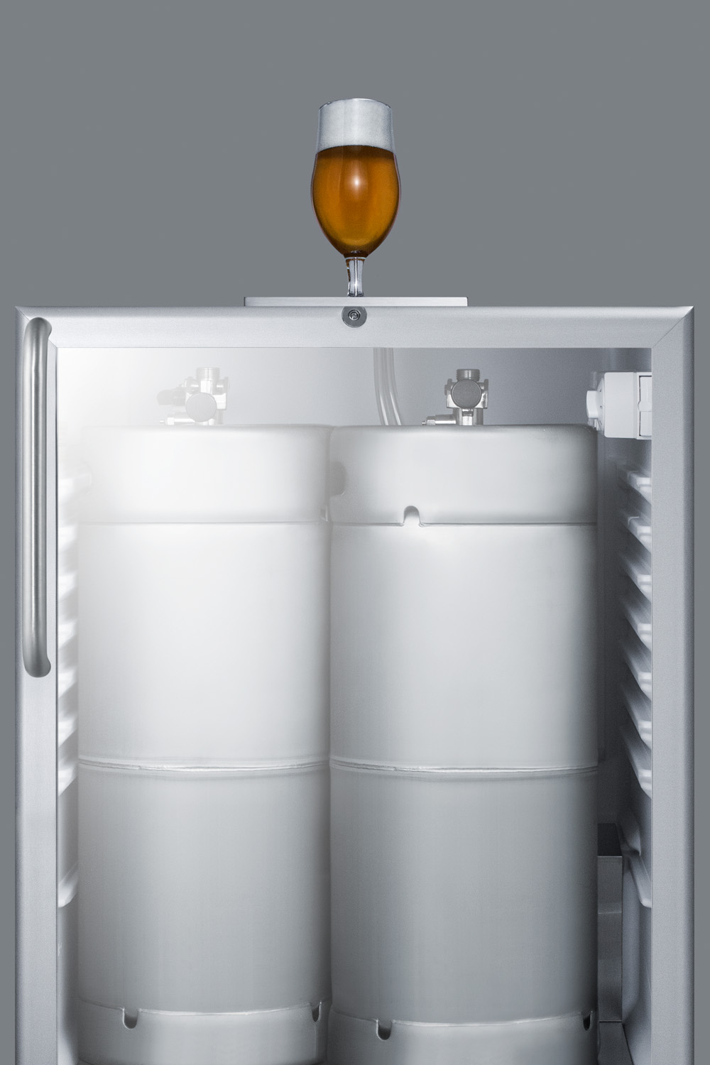 Built-in undercounter ADA height commercially listed beer dispenser with glass door, lock, and stainless steel wrapped cabinet; no tapping equipment included